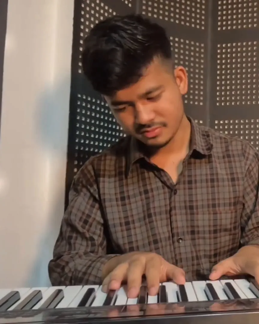 Samir Pariyar playing keyboard in the ECA studio