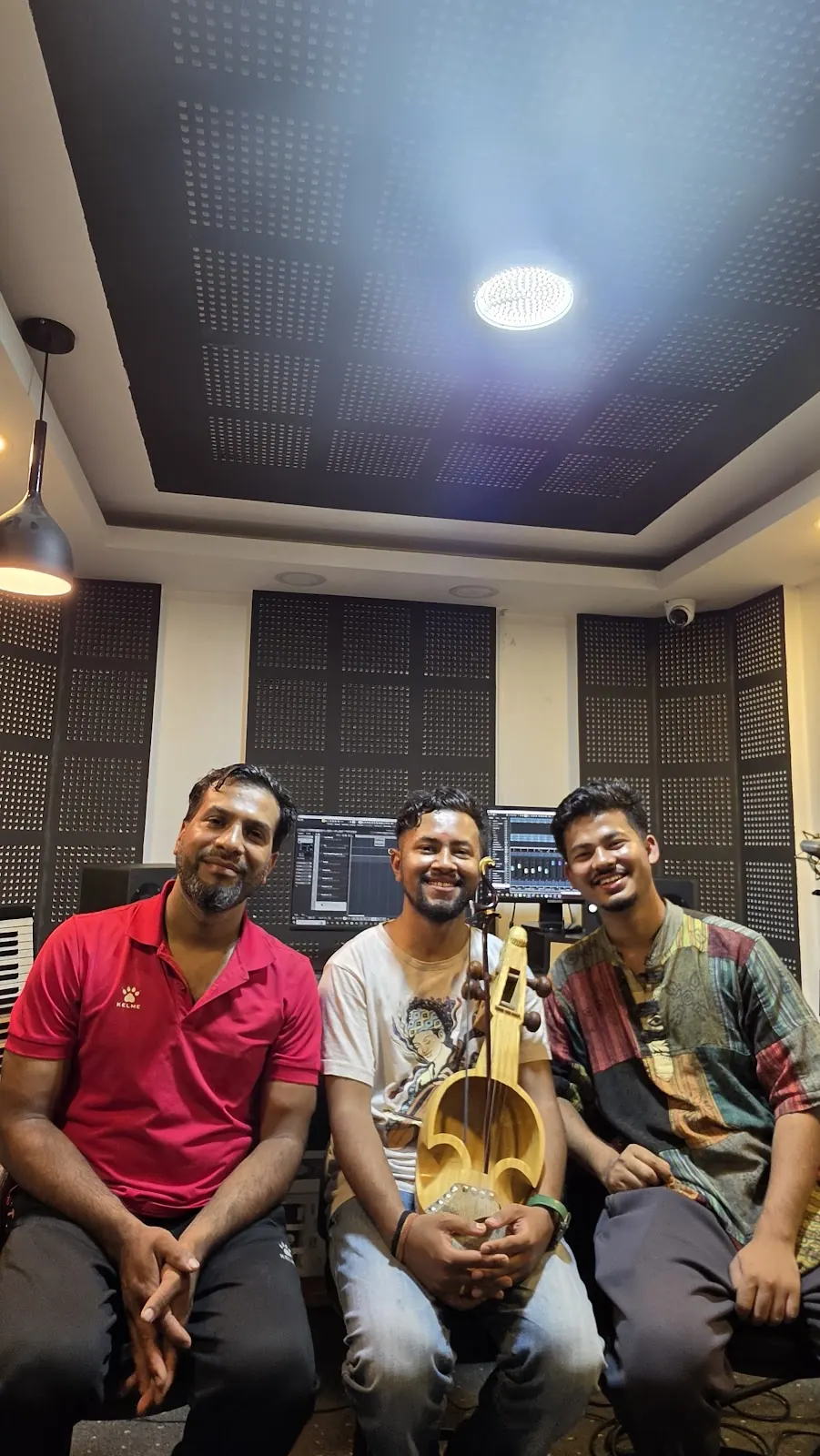 Musicians with a sarangi at Daju Bhai Studio